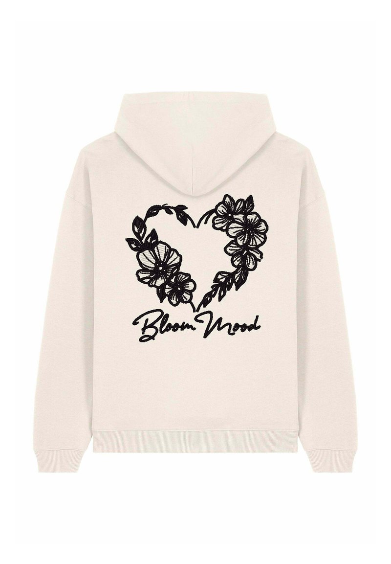 Sudadera con capucha en un beige claro, con un diseño de corazón floral negro y el texto en cursiva "Bloom Mood" en la parte posterior. Tejido suave, corte casual.