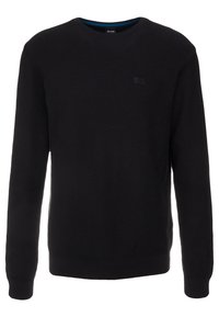Black ribbed knit sweater with a crew neckline, long sleeves, and a subtle logo on the chest. Soft texture and fitted hem.