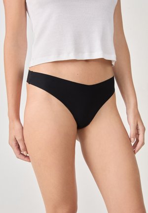 Black bikini bottom with a V-shaped front, made of smooth material. Features minimal coverage and side seams that blend seamlessly.