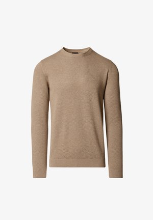 Beżowy długi sweter z dzianiny z wzorem w romby, z okrągłym dekoltem oraz ściągaczami na mankietach i dole.