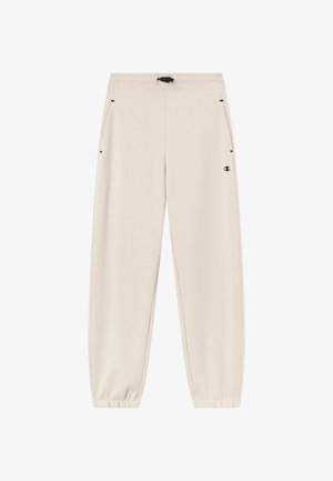Jasno beżowe spodnie dresowe wykonane z miękkiego materiału, z elastycznym pasem ze sznurkiem, ściągaczami na końcach nogawek i kieszeniami po bokach.