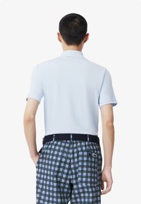 Lacoste Sport SHORT SLEEVES - Pikeepaita - bleu clair t