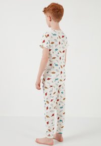 LELA REGULAR FIT - Yöasusetti - ecru red
