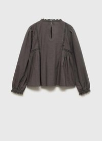 Blusa grigia scura con scollatura arrotondata, chiusura con bottoni sul retro, dettagli in pizzo sulle spalle e maniche arricciate con bordo in pizzo.