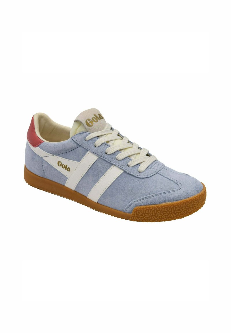 Light blue suede sneaker with white stripes, a red heel accent, and a textured gum sole; features a branded tongue and flat laces.