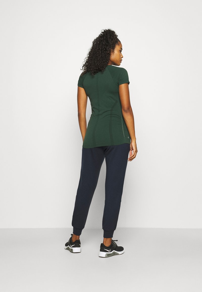 Athleta BALANCE JOGGER - Calças de fato de treino - navy