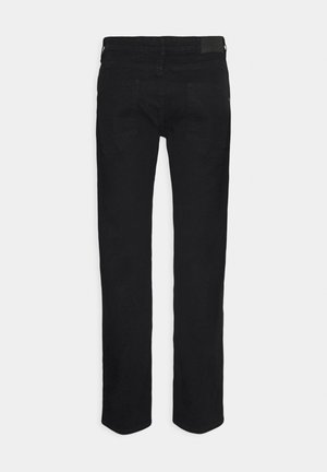 Črne traper hlače ravne rezine z obodom in dvema zadnjima žepoma. Tkanina ima gladko teksturo in minimalno šivanje.