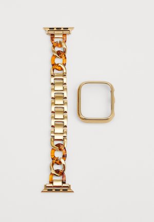 Gold metal watch band featuring tortoiseshell links, with a rectangular case attachment. Smooth surface and polished finish throughout.