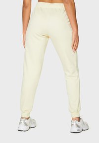 SQUATPROOF SP LEFT COMFY ACTIVE PUMP COVER  - Verryttelyhousut - cream