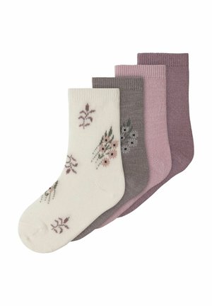 Quatre paires de chaussettes : une chaussette blanche à motifs floraux, une chaussette gris foncé, une rose clair et une mauve, toutes avec un haut côtelé et une texture douce.