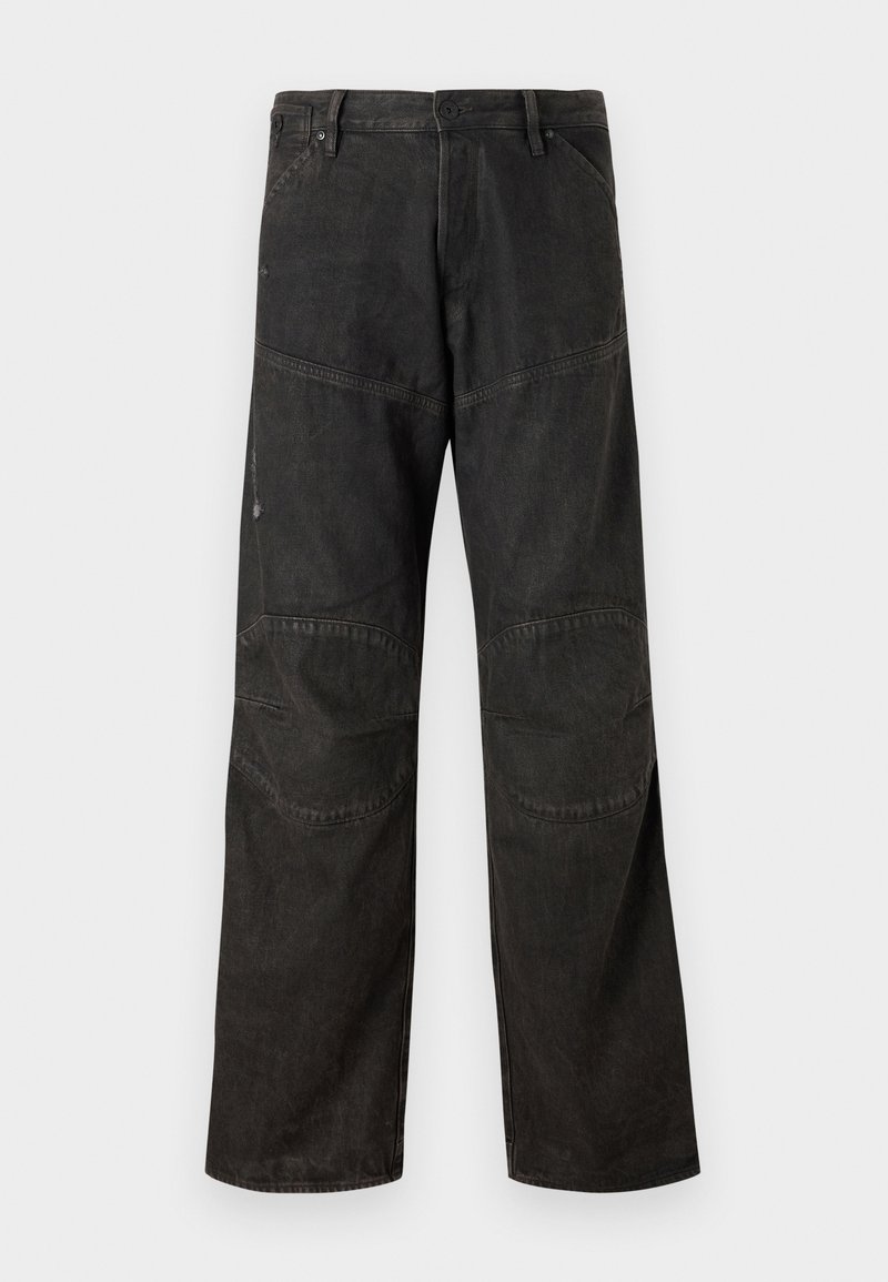 Pantalones de denim negros con un ajuste relajado, que cuentan con detalles de patchwork y un ligero desgaste, terminados con un clásico cierre de botón y cremallera.