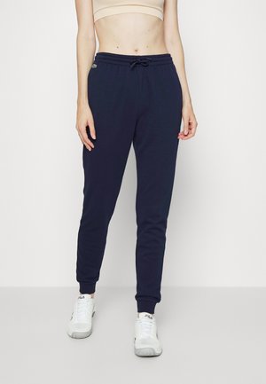 PANT - Pantaloni sportivi - bleu marine