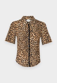Knapplang skjorte med korte ermer, med leopardmønster i nyanser av brunt og svart. Glatt tekstur med klassisk krage og frontplacket.