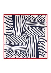 Foulard en soie présentant un motif audacieux de rayures zébrées bleu marine et blanches, bordé de rouge. Le design combine des rayures épaisses et fines dans une disposition géométrique.