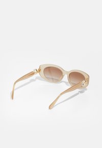 Swarovski Solbriller - beige/brown
