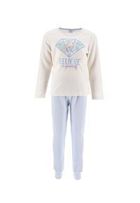 Conjunto de pijama de forro polar que incluye una camiseta de manga larga en color crema con un gráfico de diamante y texto, emparejada con pantalones ajustados de color azul claro.
