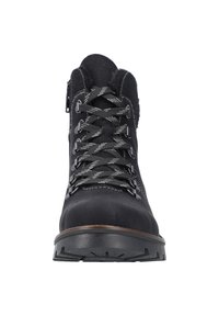 Black hiking boots with a textured upper, reinforced eyelets, and contrasting gray laces. Features a rugged sole with pronounced treads.