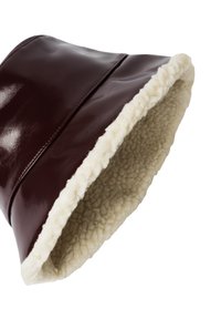 Dark brown leather bucket hat with soft cream-colored fleece lining inside the brim.