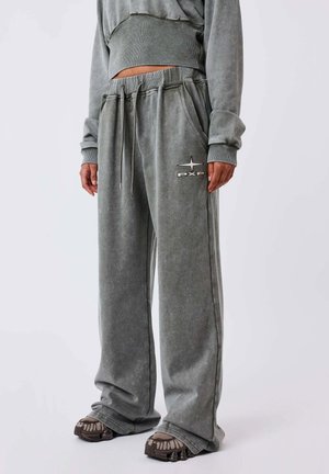 JOGGING WORN - Tracksuit bottoms - olive
