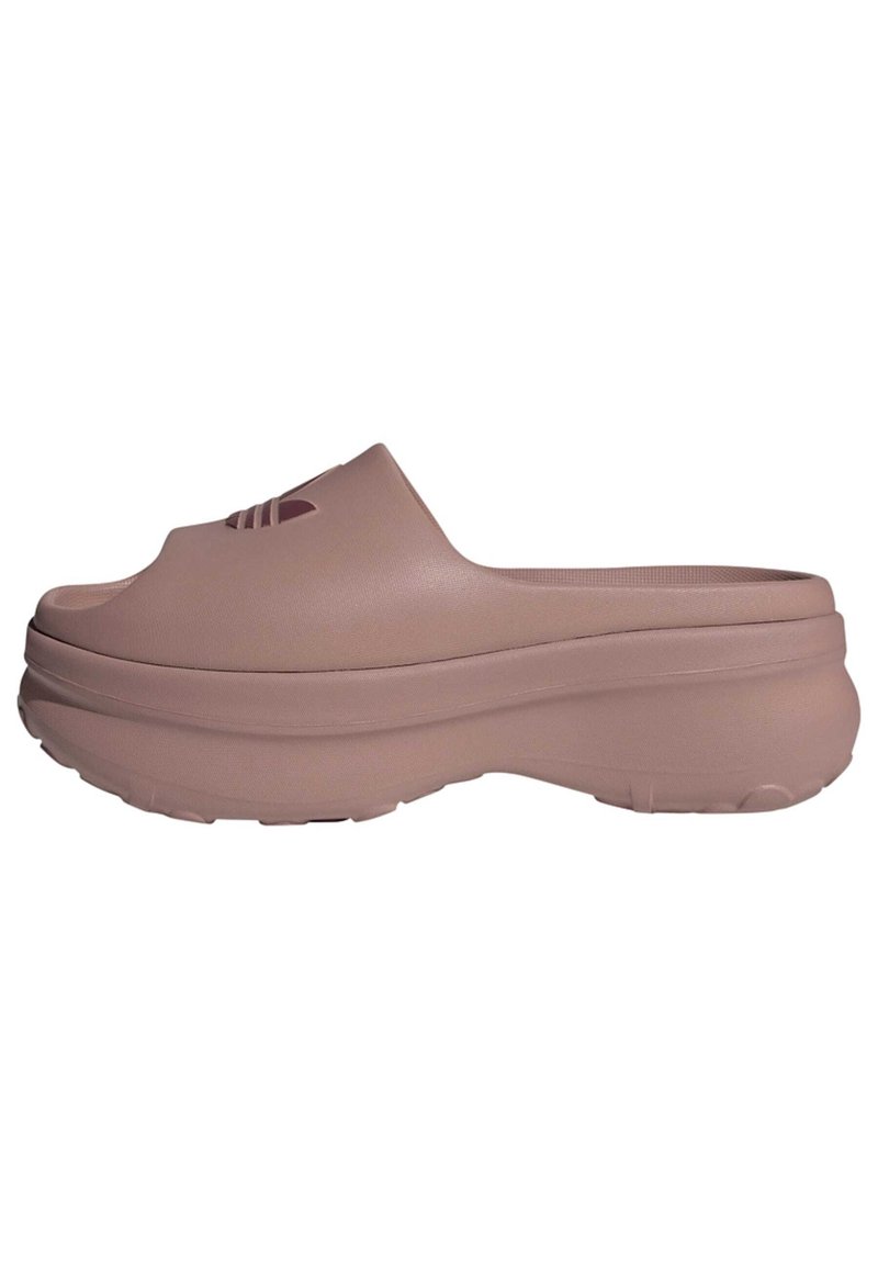 Mauve Slip-On-Clogs aus strukturiertem Kunststoff, mit abgerundeter Zehenpartie, erhöhtem Mittelfußbereich und Belüftungsschlitzen im vorderen Bereich.