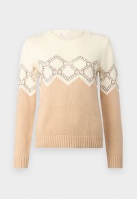 Maglione beige e crema con un motivo geometrico sulla spalla, dotato di un collo rotondo, polsini e orlo a coste. Morbida texture a maglia.