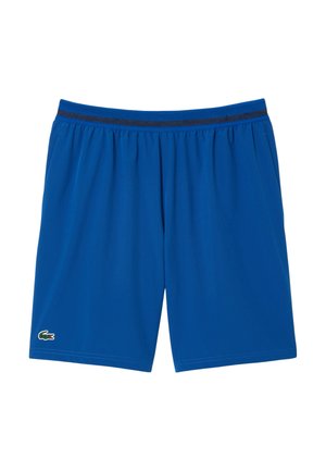 Pantalones cortos deportivos azules con cintura elástica y detalle de malla negra. Cuenta con un pequeño logo verde de Lacoste en la pierna izquierda.