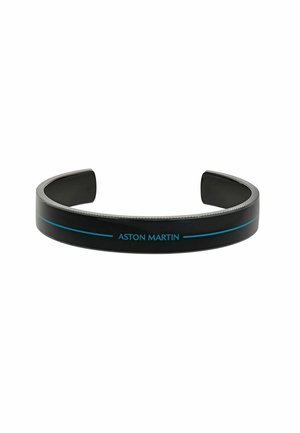 Schwarzes offenes Manschettenarmband mit hellblauen Linien und dem Text "ASTON MARTIN" zentriert auf der Vorderseite.