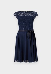 Navy dress with lace bodice and cap sleeves. Skirt flows gently, accented by a satin ribbon at the waist. Decorated with sequins.