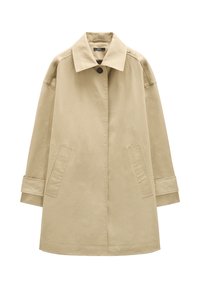 Beżowy płaszcz trench z bawełny, z kołnierzem, dwoma bocznymi kieszeniami i podwiniętymi rękawami. Prosty design z czystymi liniami i subtelną teksturą.
