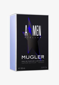 Boîte noire avec des accents argent et bleu. Présente un graphique d'étoile en évidence. Contient "A*MEN STELLAR" et "MUGLER." Taille : 100 mL.