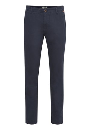 Granatowe bawełniane chinosy o slim fit, z zamkiem błyskawicznym, pojedynczym zapięciem na guziki oraz szlufkami na pasek. Gładka tekstura i minimalistyczny design.