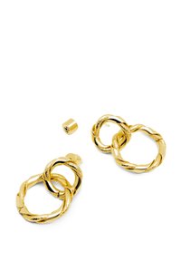 Pendientes de aro de oro con un diseño retorcido y una superficie texturizada. Incluye un vástago extraíble para un cierre seguro.