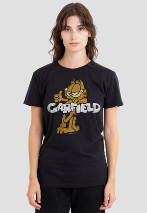 Black cotton t-shirt featuring a graphic print of Garfield in yellow and grey, with bold "GARFIELD" text below the character.