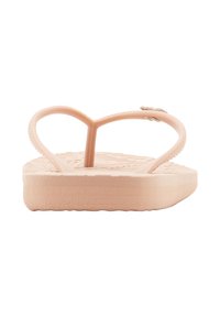 Flip-flops with a textured peach rubber sole and straps. The design features a heart-shaped toe post and a ridged footbed for grip.