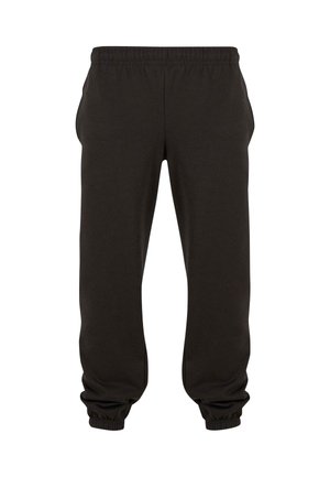 Pantalons de survêtement noirs avec une taille élastique et des poignets élastiques, dotés de poches latérales et d'une texture lisse. Design simple, sans motifs visibles.