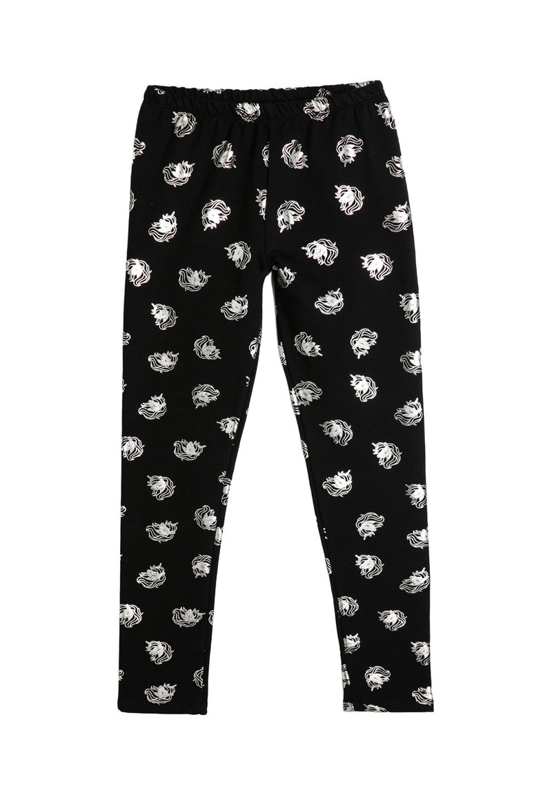 Leggings negros hechos de una tela suave con un patrón repetido de cabezas de león blancas, cinturilla elástica y un diseño ceñido.
