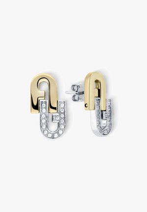 Gold and silver metal earrings shaped like interlocking letters, featuring a sparkling rhinestone accent on the silver part.