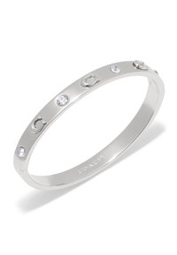 Silver metal bangle bracelet featuring three clear crystals and logo accents, smooth texture, and a minimalist circular design.