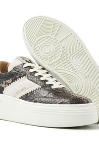 Sneakers with snake-print leather upper in muted browns and creams. White rubber sole with textured tread and contrasting accents.