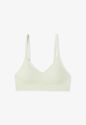 Bralette de tela suave de color verde claro con tirantes finos ajustables y una banda ancha acanalada debajo del busto, mostrado plano sobre un fondo blanco.