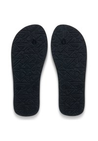 Μαύρα εσωτερικά πέλματα από καουτσούκ με υφή που διαθέτει γεωμετρικά μοτίβα και κυκλικές οπές για αερισμό. Σχεδιασμένα για άνεση και υποστήριξη.