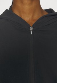 Nebbia WOMEN CROPPED HOODIE - Užtrauktuku užsegamas treningas - black
