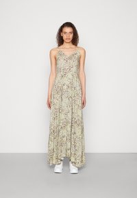 Maxikleid mit floralem Muster in Pastellgrün, mit dünnen Trägern und V-Ausschnitt. Glattes Material und fließende Silhouette.