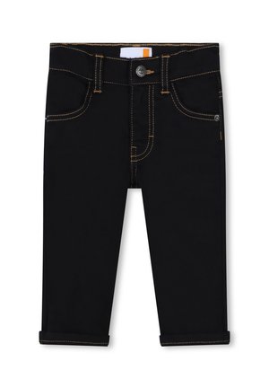 Pantalons en denim noir à coupe fuselée, avec des coutures dorées, fermeture à bouton et ourlets retroussés. Comprend des poches avant et arrière.