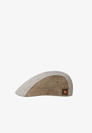 Flat cap in beige and brown herringbone fabric with a small round leather logo patch on the side.