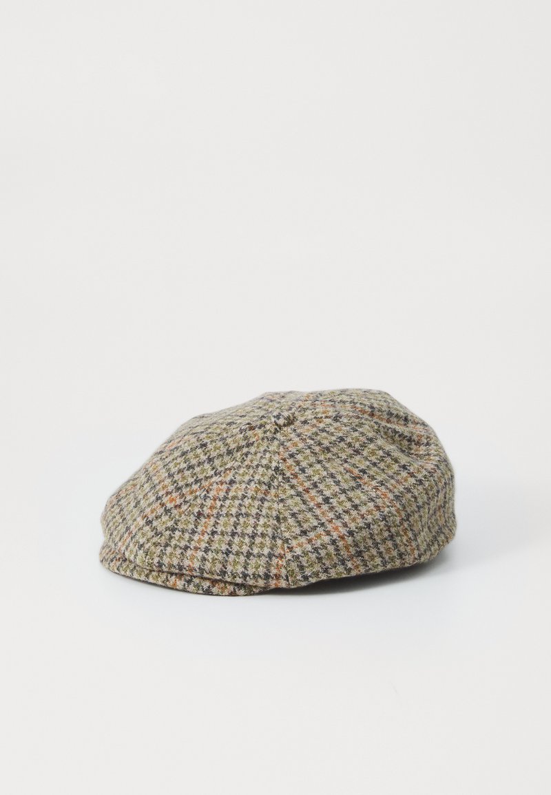 Tweed cap featuring a green, brown, and orange houndstooth pattern, round shape, and soft texture with a slightly structured fit.