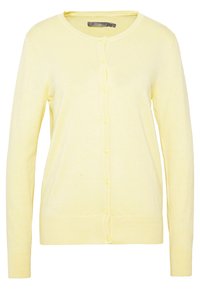 Żółty kardigan z okrągłym dekoltem, długimi rękawami i zapięciem na guziki. Wykonany z miękkiego materiału o gładkiej fakturze i prążkowanym wykończeniu.