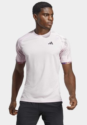 adidas Performance RAGLAN TEE - T-shirt con stampa - clear pink