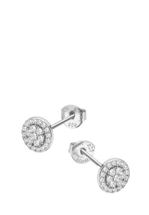Boucles d'oreilles en argent à clou présentant un design circulaire orné de pierres étincelantes, créant un motif floral. Poinçonnées 925 pour garantir la qualité de l'argent.