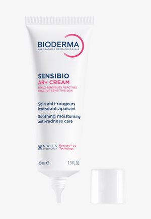 Tube de crème Bioderma Sensibio AR+ avec bouchon blanc retiré, hydratant pour peau sensible réactive, soin apaisant anti-rougeurs, 40 ml.